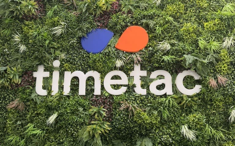 TimeTac logo on the living wall at the company's headquarters